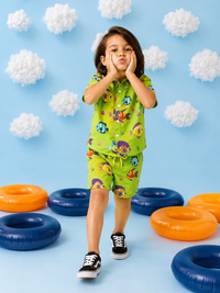 Boy wearing Anaario Tropical Fish Shorts