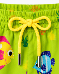 Boy wearing Anaario Tropical Fish Shorts
