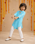 Turquoise palm-motif asymmetrical kurta - boy dancing