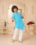 Turquoise palm-motif asymmetrical kurta - boy posing