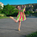 Girl wearing Anaario Watermelon Stripe Dress