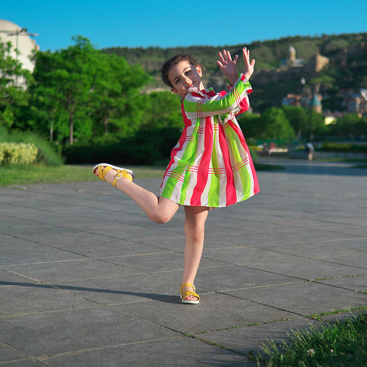 Girl wearing Anaario Watermelon Stripe Dress