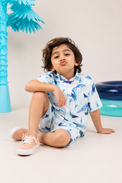 Boy wearing Anaario Whale Ocean Shorts