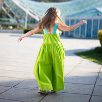 Girl wearing Anaario Cosmic Bewitched Jumpsuit, Aqua Magic Print