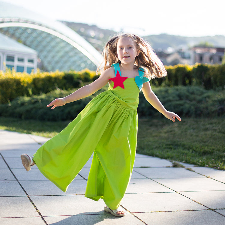 Girl wearing Anaario Cosmic Bewitched Jumpsuit, Aqua Magic Print
