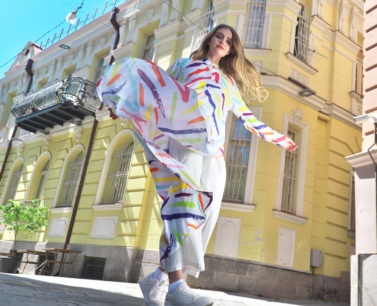 Person wearing Anaario Candy Fever Co-ord Set, white maxi duster with multicolor brushstroke print over matching pants
