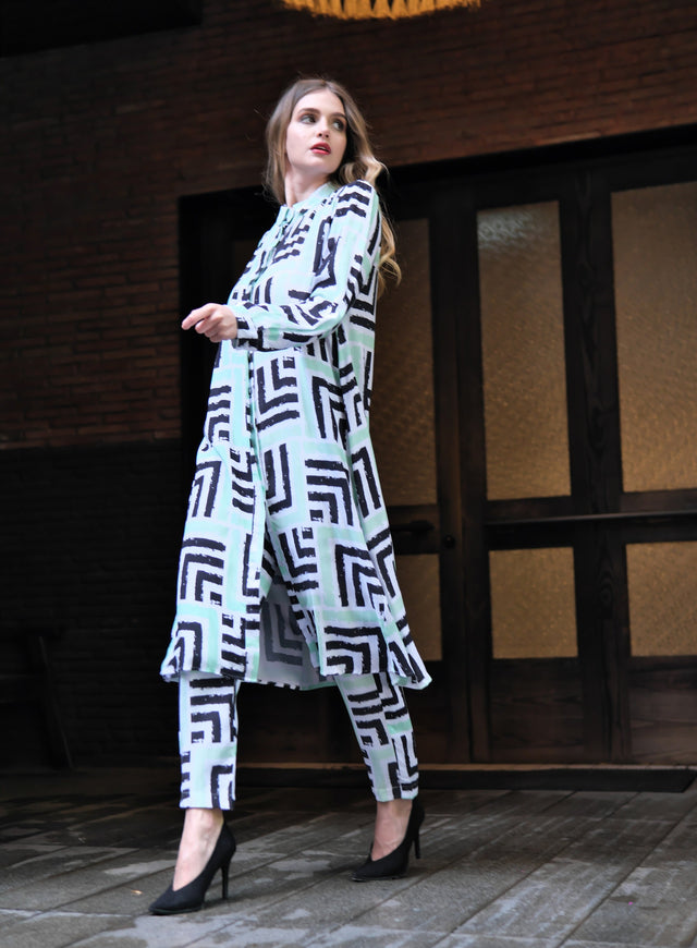 Person wearing Anaario Casablanca Co-ord Set, mint and black geometric print duster with matching pants