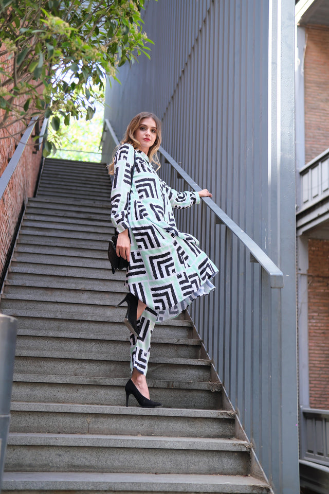 Person wearing Anaario Casablanca Co-ord Set, mint and black geometric print duster with matching pants