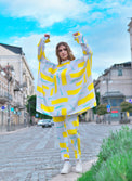 Person wearing Anaario City Girl Co-ord Set, white and yellow abstract print oversized top and matching pants