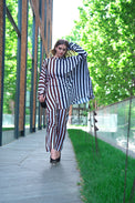 Person wearing Anaario City Girl Co-ord Set, mixed burgundy and navy stripe shirt and matching pants