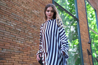Person wearing Anaario City Girl Co-ord Set, mixed burgundy and navy stripe shirt and matching pants