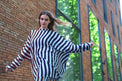 Person wearing Anaario City Girl Co-ord Set, mixed burgundy and navy stripe shirt and matching pants