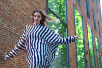 Person wearing Anaario City Girl Co-ord Set, mixed burgundy and navy stripe shirt and matching pants