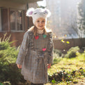 Girl wearing Anaario Meadow Mist Pea Coat, grey plaid coat with heart appliques and tie waist