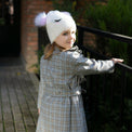 Girl wearing Anaario Meadow Mist Pea Coat, grey plaid coat with heart appliques and tie waist