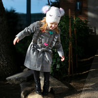 Girl wearing Anaario Meadow Mist Pea Coat, grey plaid coat with heart appliques and tie waist