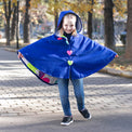 Girl wearing Anaario Mulan Cape Coat, royal blue hooded cape coat with heart button closures