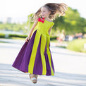Girl wearing Anaario Pixie Dixie colorblock maxi dress in lime green, purple, and orange