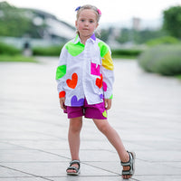 Girl wearing Anaario Ray of Sunshine Shirt