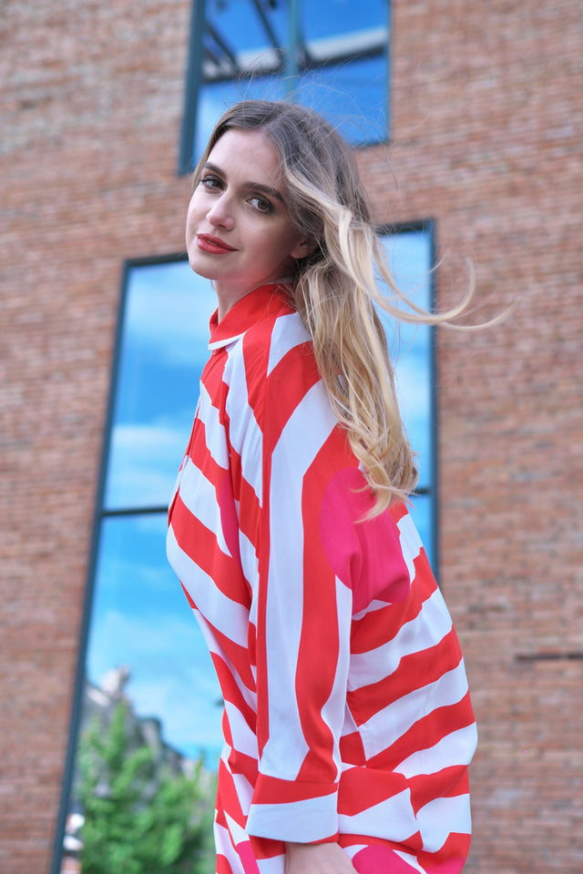 Woman wearing Anaario Sweet Serenade Co-ord Set, red and white striped shirt and matching pants
