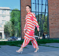 Woman wearing Anaario Sweet Serenade Co-ord Set, red and white striped shirt and matching pants