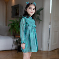 Girl wearing Anaario Teal Clouds Dress