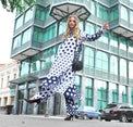Person wearing Anaario Wild Wanderer Co-ord Set, navy and white mixed polka dot maxi duster with matching pants