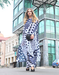 Person wearing Anaario Wild Wanderer Co-ord Set, navy and white mixed polka dot maxi duster with matching pants