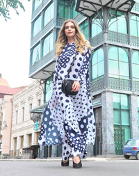 Person wearing Anaario Wild Wanderer Co-ord Set, navy and white mixed polka dot maxi duster with matching pants