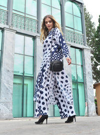 Person wearing Anaario Wild Wanderer Co-ord Set, navy and white mixed polka dot maxi duster with matching pants