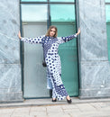 Person wearing Anaario Wild Wanderer Co-ord Set, navy and white mixed polka dot maxi duster with matching pants